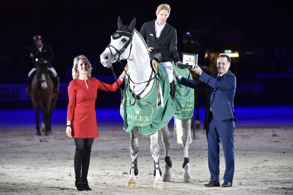 Marcus Ehning with Anky van Grunsven chairman of Indoor Brabant and Joel Aschelmann of Rolex