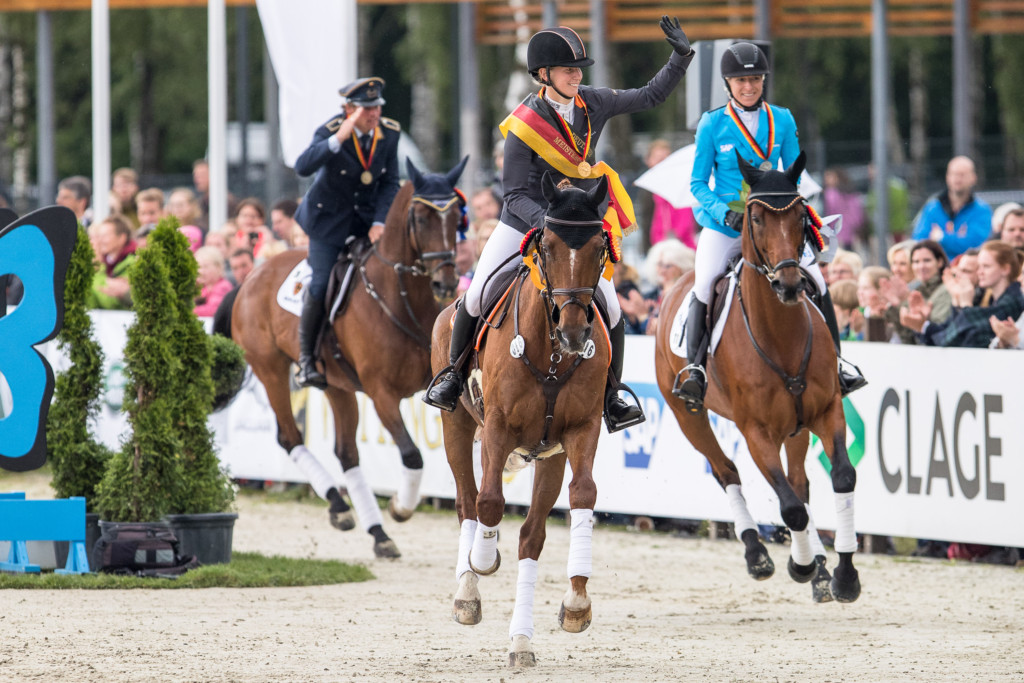 Winners are grinners. The German crowd love their riders winning of course! 