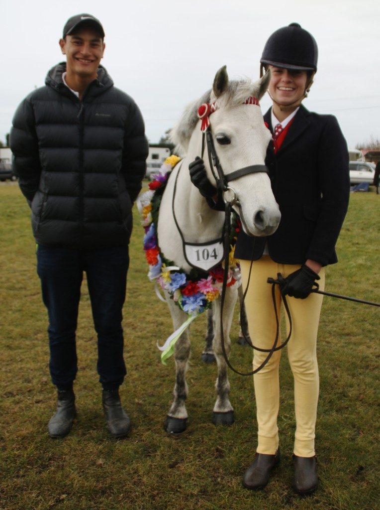 Maia Waretini with Supreme Champion in hand winner, Abby Sinclair with My Prima Donna, a Welsh cross English riding pony