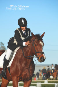 Samara Singh looks very pleased with Blue Springs Holly. (Image Olivia Skidmore Photography)