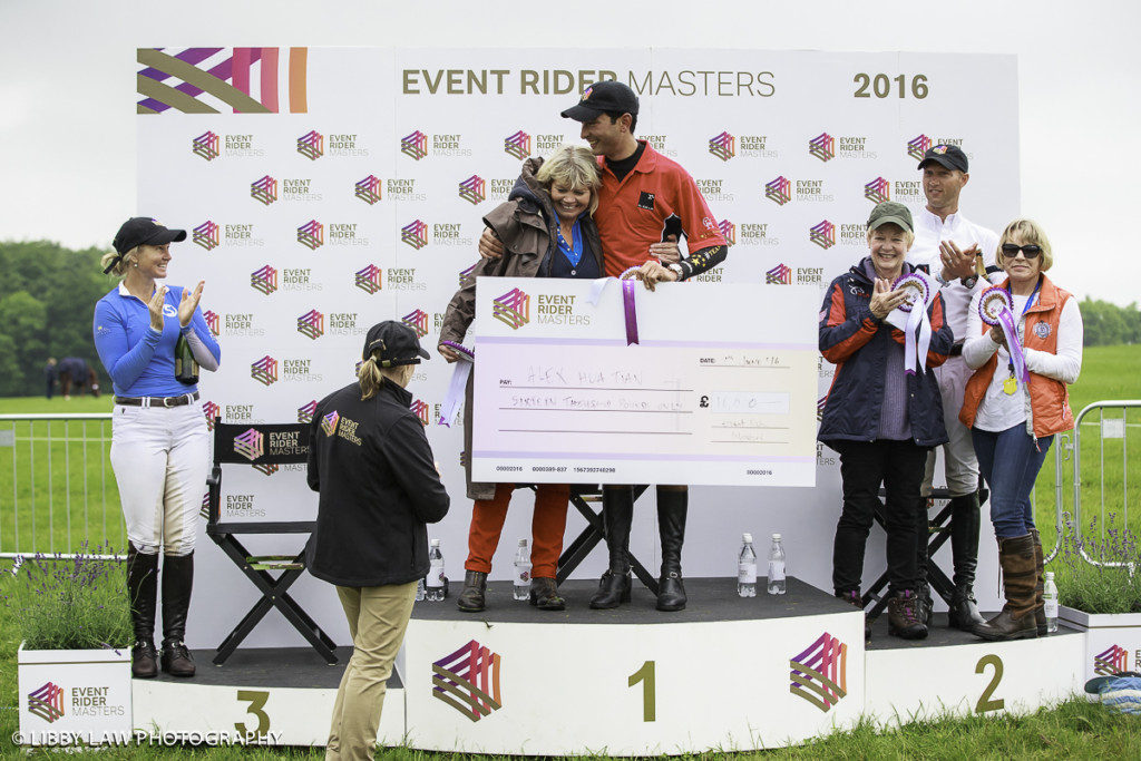 Alex Hua Tian with the winners cheque on the podium with Clark Montgomery (right) and Jonelle Price (left). Event Rider Masters CIC3* at Bramham. (Image: Libby Law).