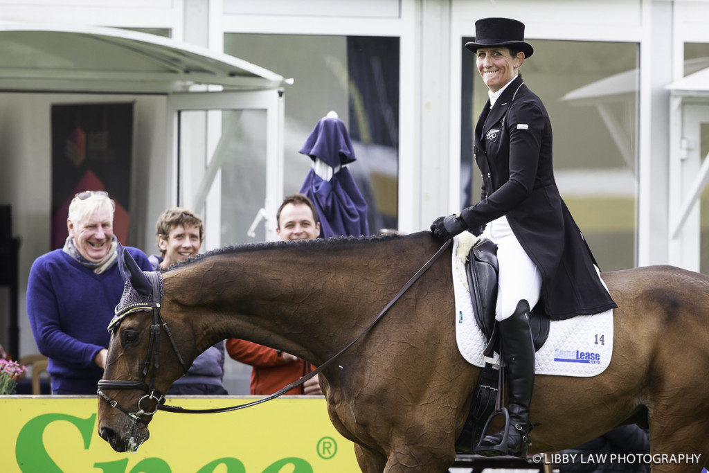 Supporters are all smiles! Caroline Powell on Flying Finish goes into fourth place in the Equi-Trek Bramham CCI3* class (Image: Libby Law)