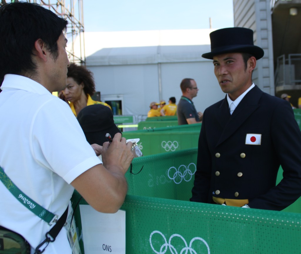 Ryes Kitajima, in the mixed zone after competing on Just Chocolate in the dressage phase.