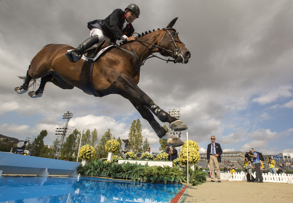 Nick Skelton of Great Britain riding Big Star goes over the water jump in the first round of the Furusiyya FEI Nations Cup Jumping Final 2016 Barcelona (Image: FEI)