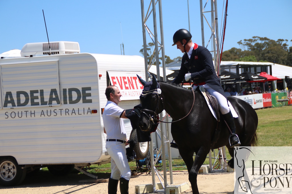 Tim Boland congratulates Oliver Townend for a great ride on his horse Napoleon. 