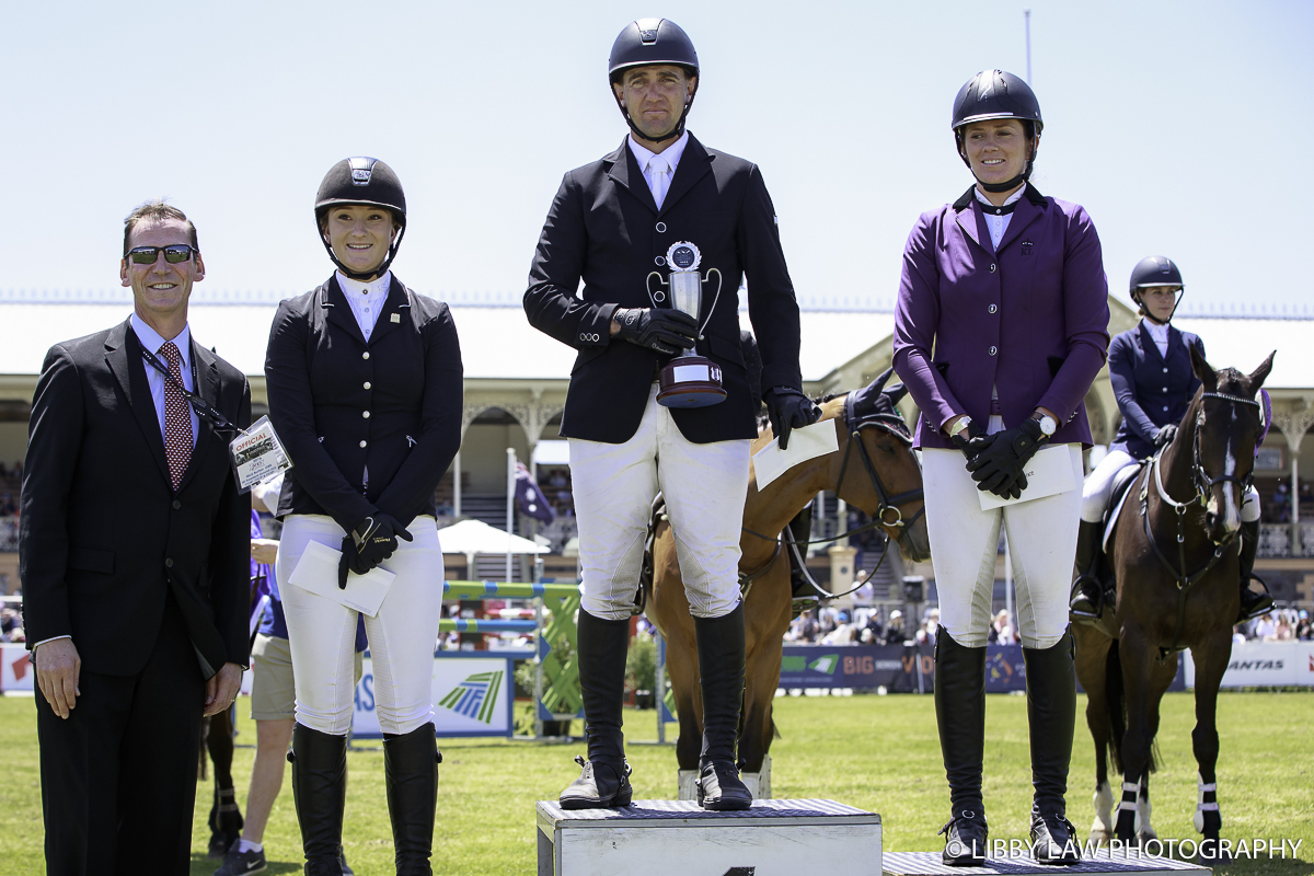 Andrew Barnett on the podium, with Gemma Tinney and Katja Weimann (Image: Libby Law Photography)