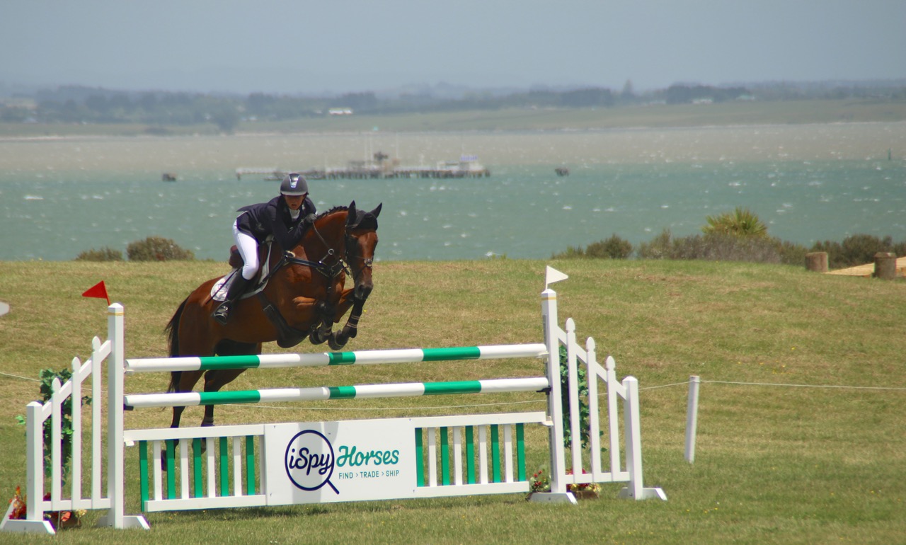 Samantha Felton competing at last year's event with the stunning backdrop of the Manukau Harbour